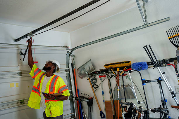 Professional Garage Door Panel Replacement technician working in Junction City, KS